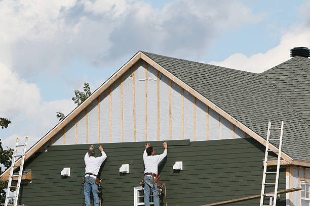 Professional Siding Contractor technician working in Charles City, VA